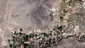 HLS L30 bands 4,3,2 showing Phoenix and the contrasting agricultural and desert landscape west of the city May 2021.
