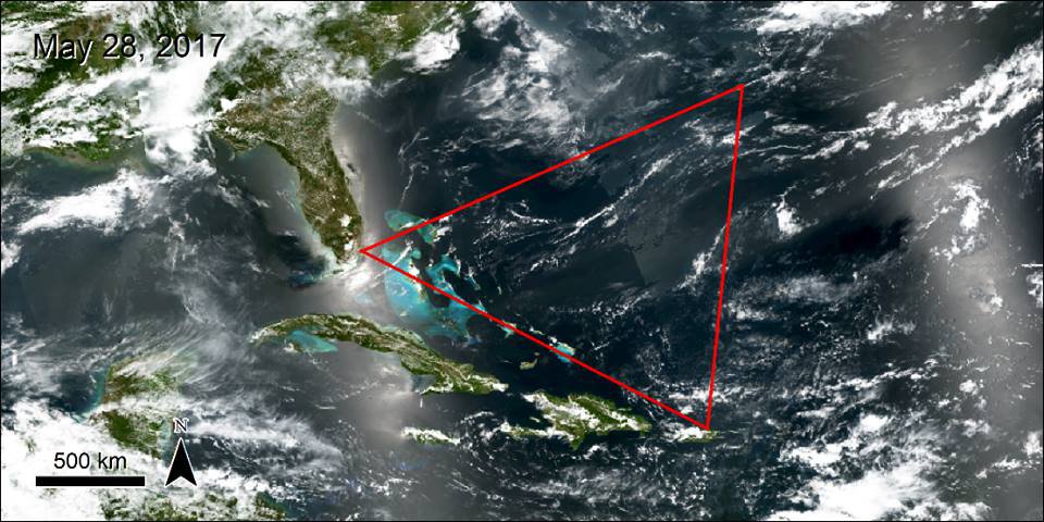 A S-NPP NASA VIIRS image of the bermuda triangle with a triangle drawn over the area.