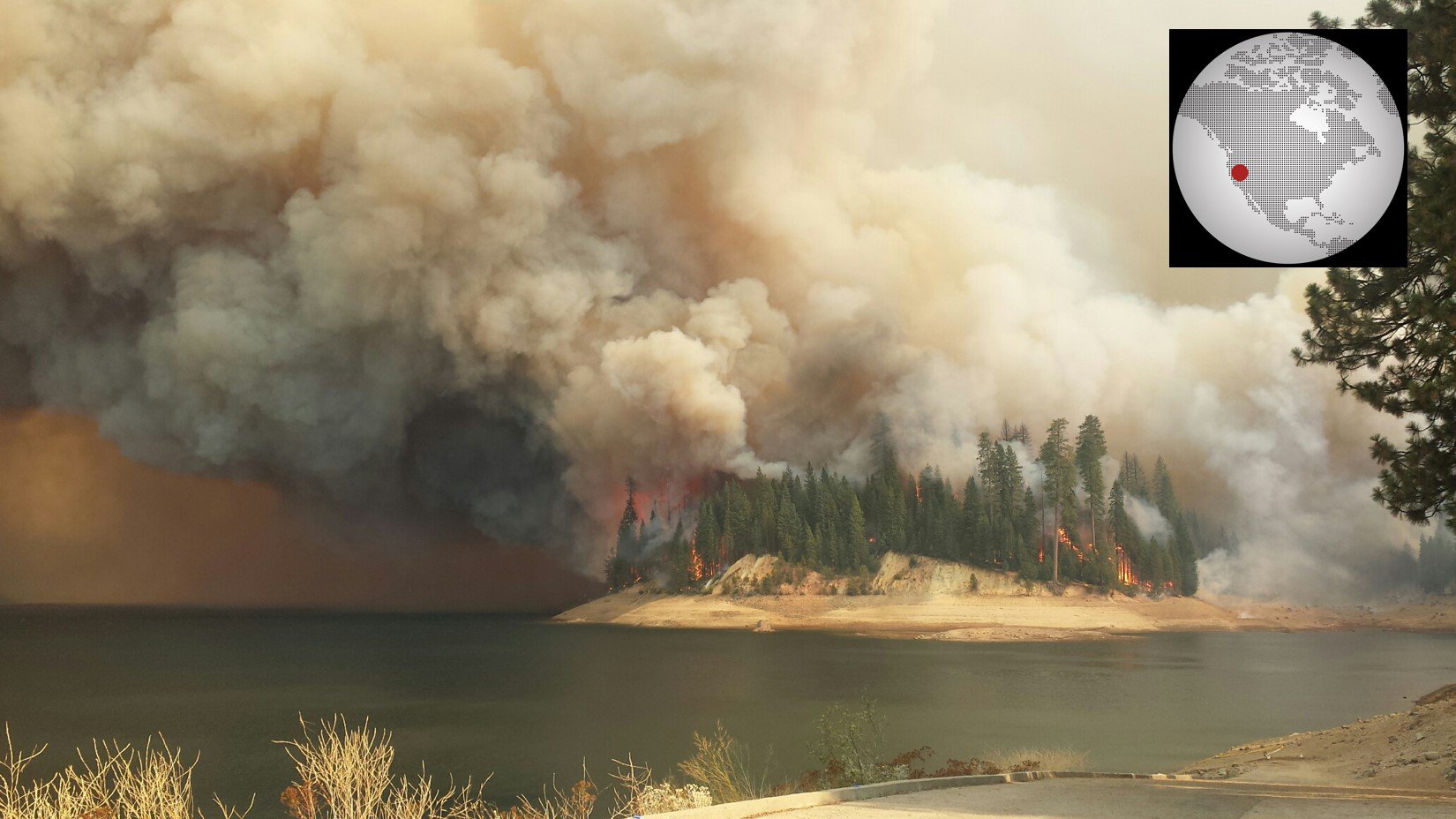 This image captures the King Fire actively burning through Stumpy Meadows Campground located on Stumpy Meadows Reservoir, CA (Photo by U.S. Forest Service Region 5).