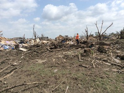 A public domain photo by the National Weather Service of the aftermath a violent EF-4 tornado in Pilger, Nebraska.